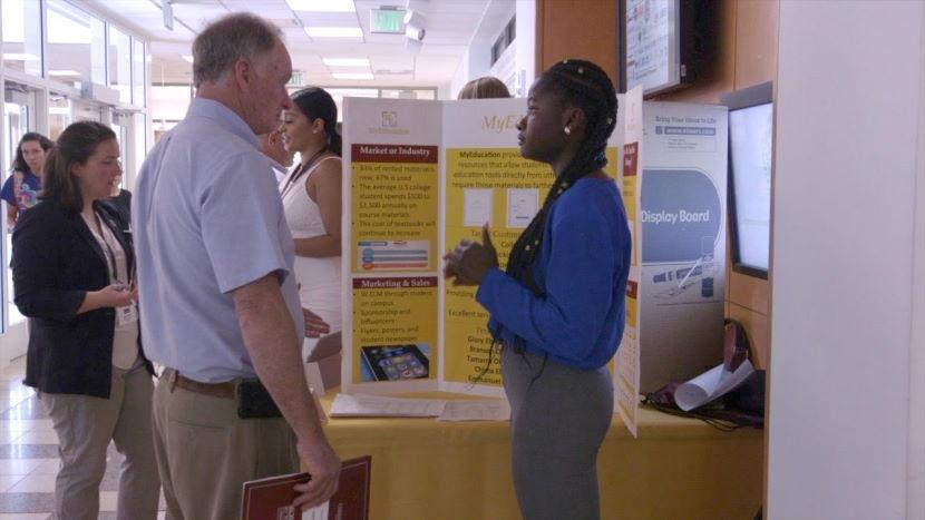 Student gives presentation during competition