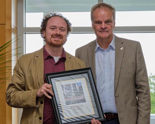 Dr. Michael McCarty accepting an award
