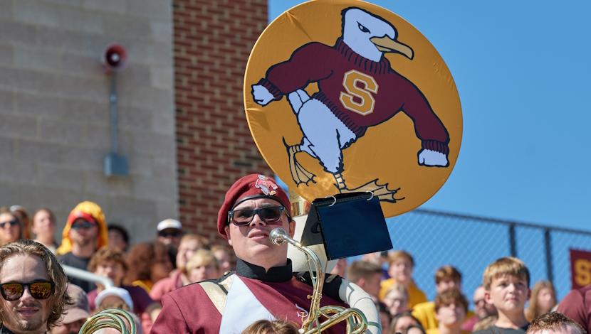 Baned member plays from the stands