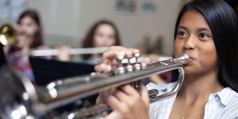 student playing trumpet