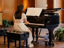 Young Student Playing Piano