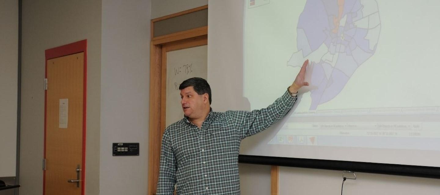 professor showing class a map on screen