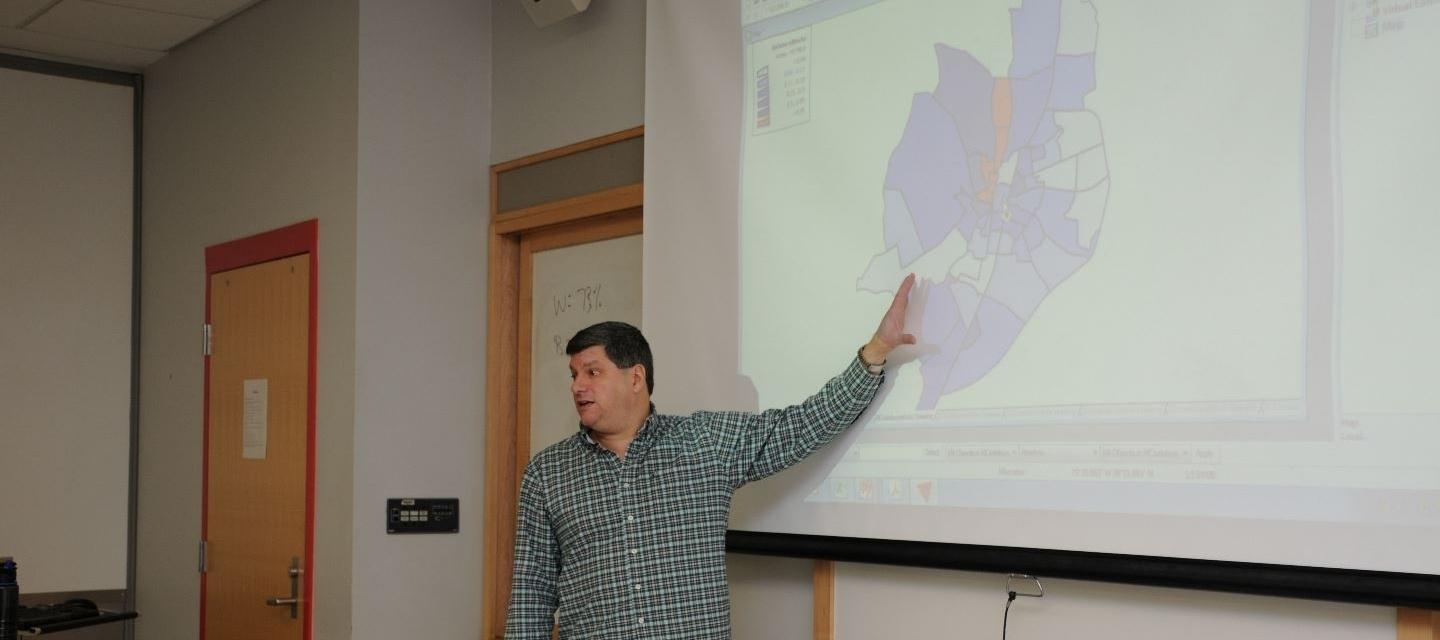 professor showing class a map on screen