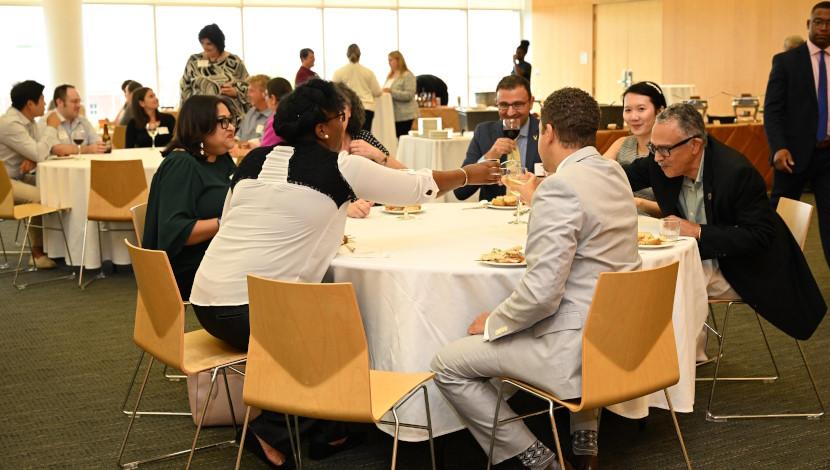 Faculty Toast at a circle table