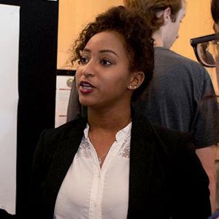 student at research conference