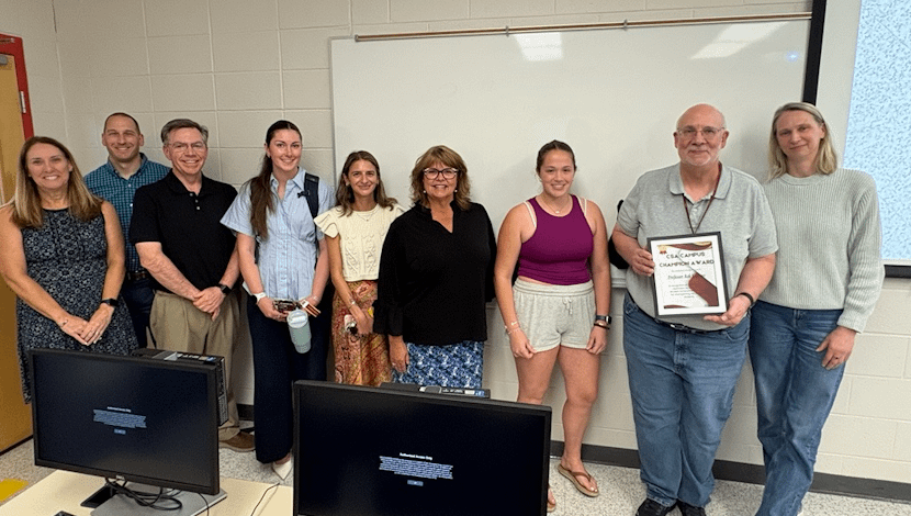 Spring 2026 Campus Champion – Professor Rob Kantzes receiving award