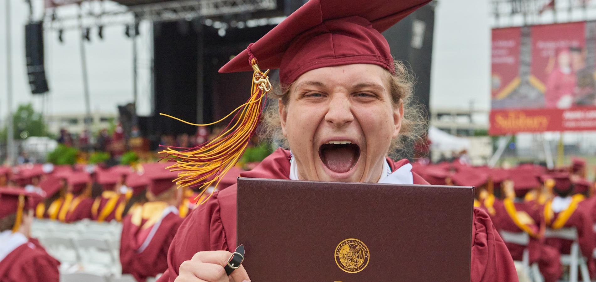Student with diploma