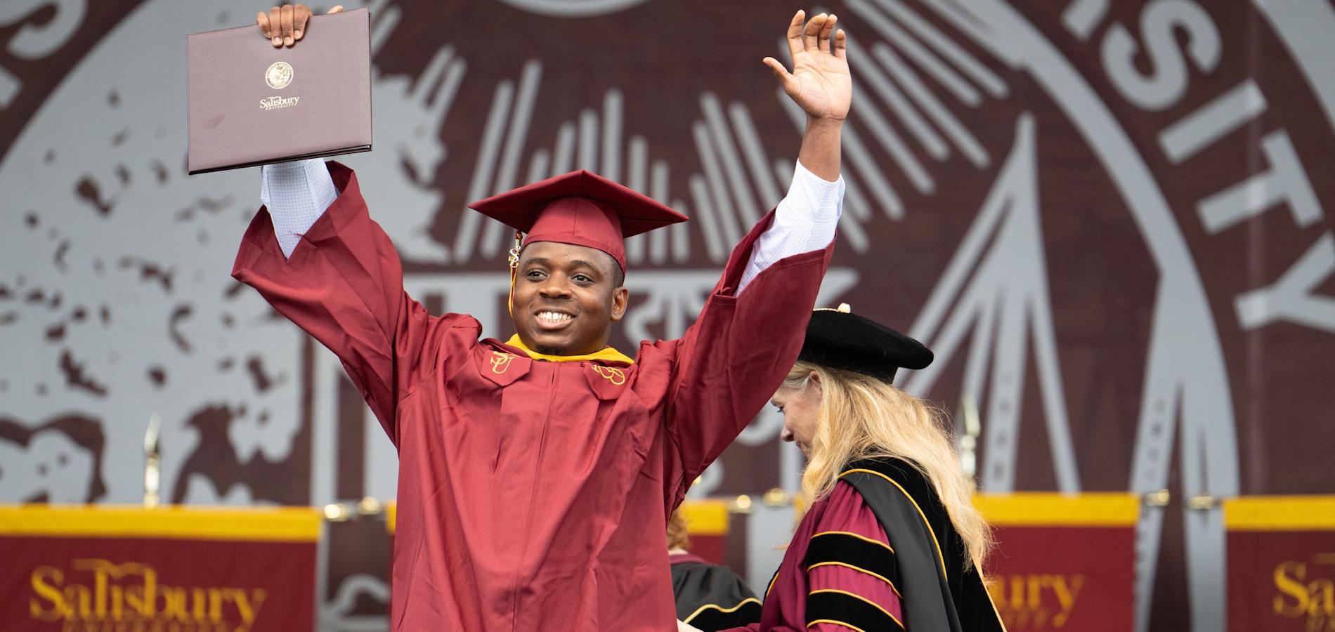 Student smiling at graduation