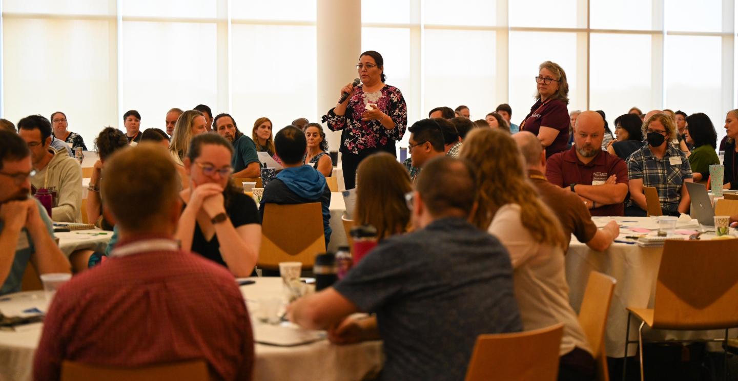 Large group of faculty at an event