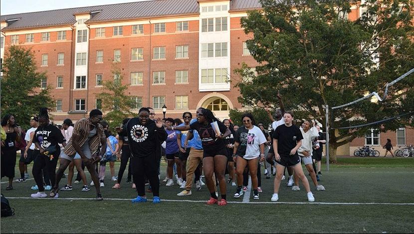 Students outside on campus playing games