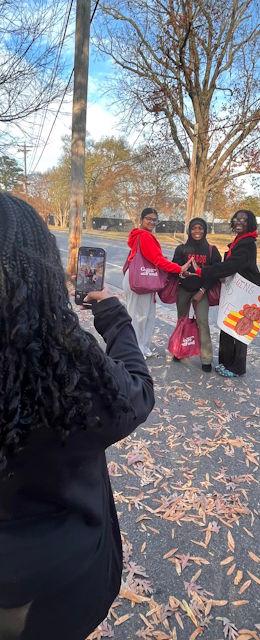 volunteer taking photos of volunteers