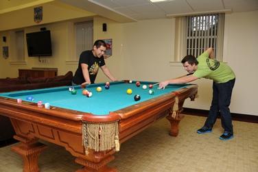 students playing pool