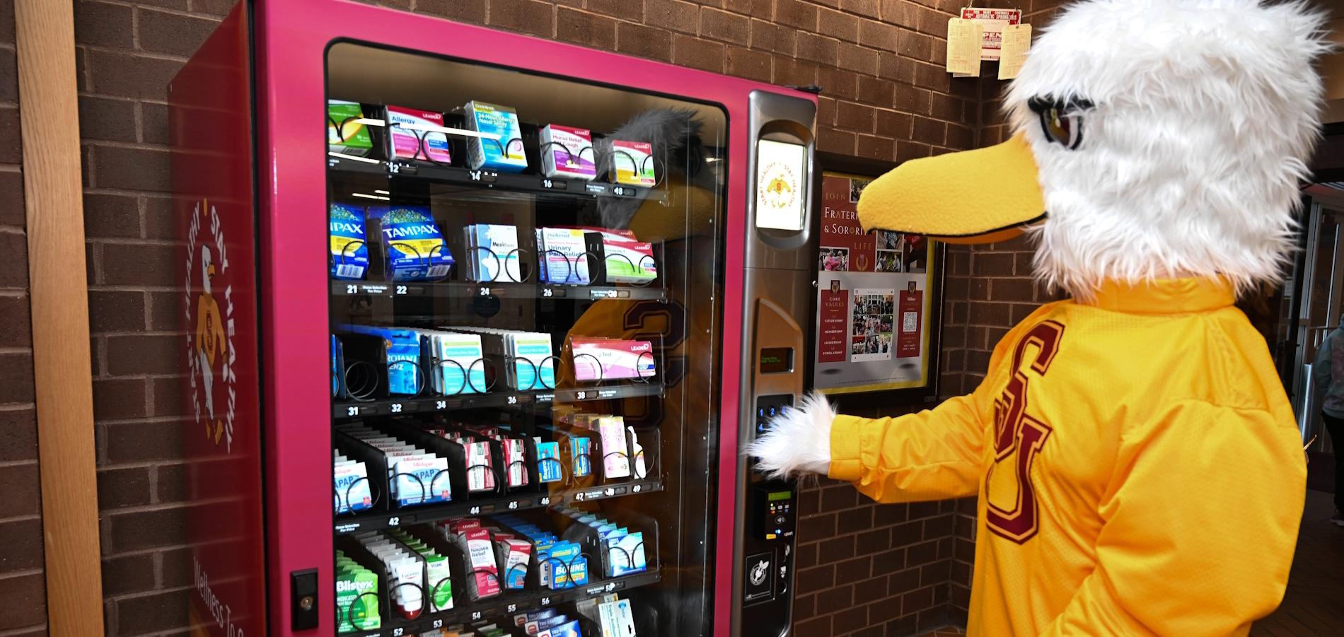 Sammy the Sea Gull using health services vending machine