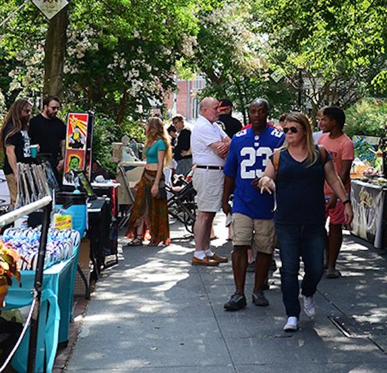 Parents and Student walk campus during an event