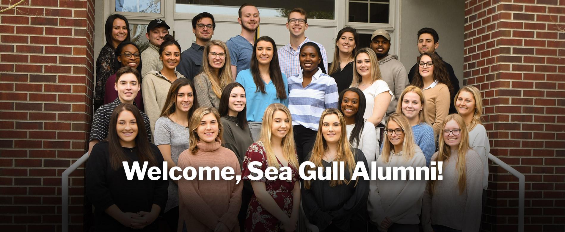 Alumni on steps Welcome Sea Gull Alumni Our Centennial Year