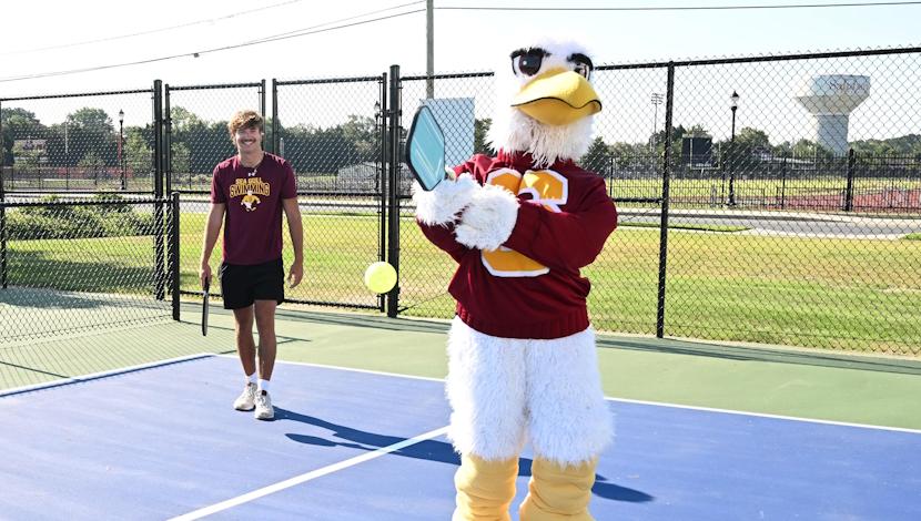 Pickleball Court with Sammy the Sea Gull and a student