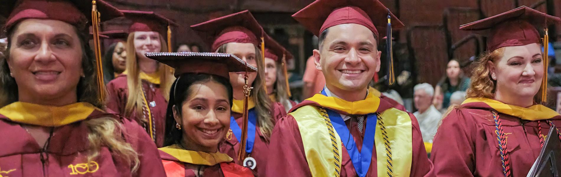 SU graduate students at evening commencement earn masters and doctoral degrees