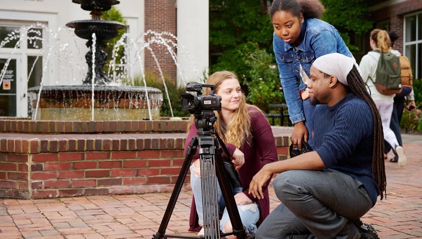 Professor and students shoot video outside Fulton Hall