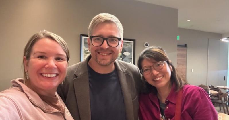 Dr. Matthew Sroka with two SU professors