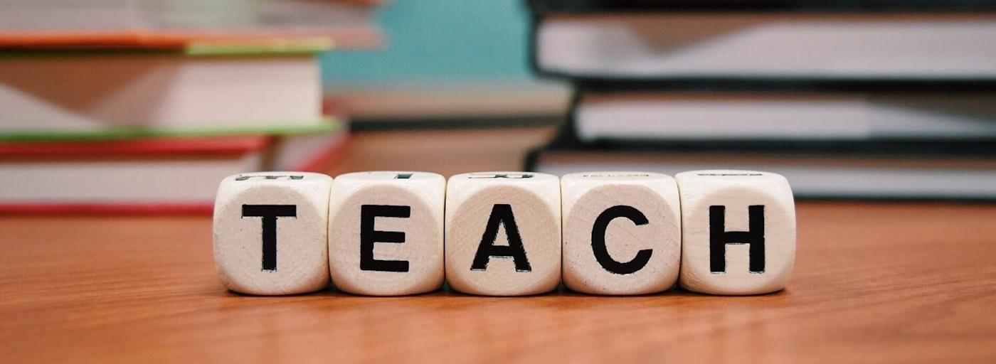 Blocks in the Salisbury University education department that spell out teach
