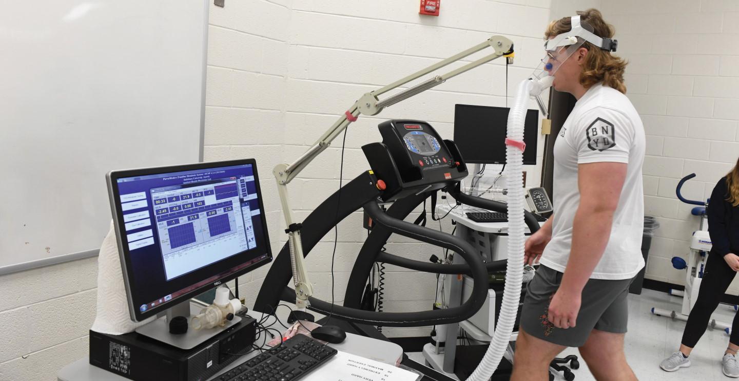 Student on tread mill in Exercise Science Major classroom