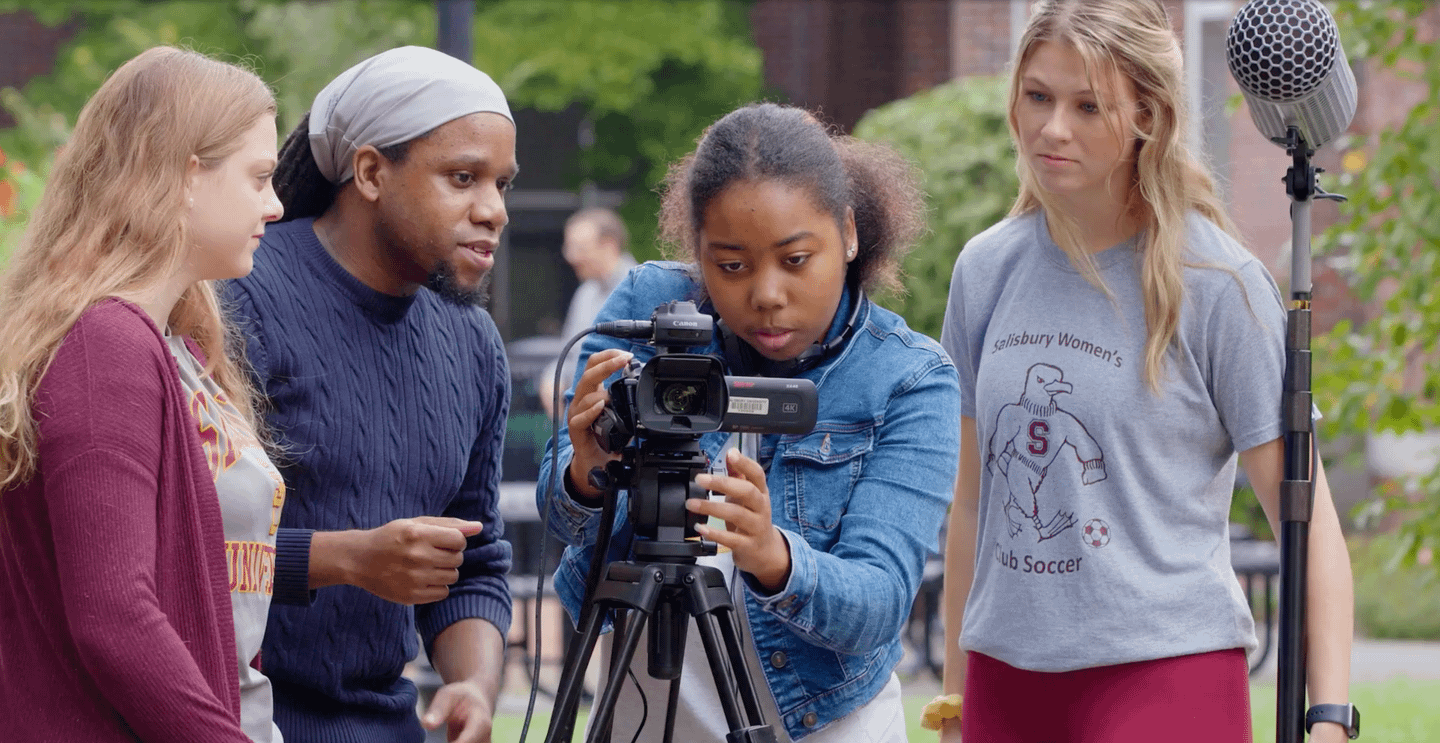 Students & professor during an outdoor filming session