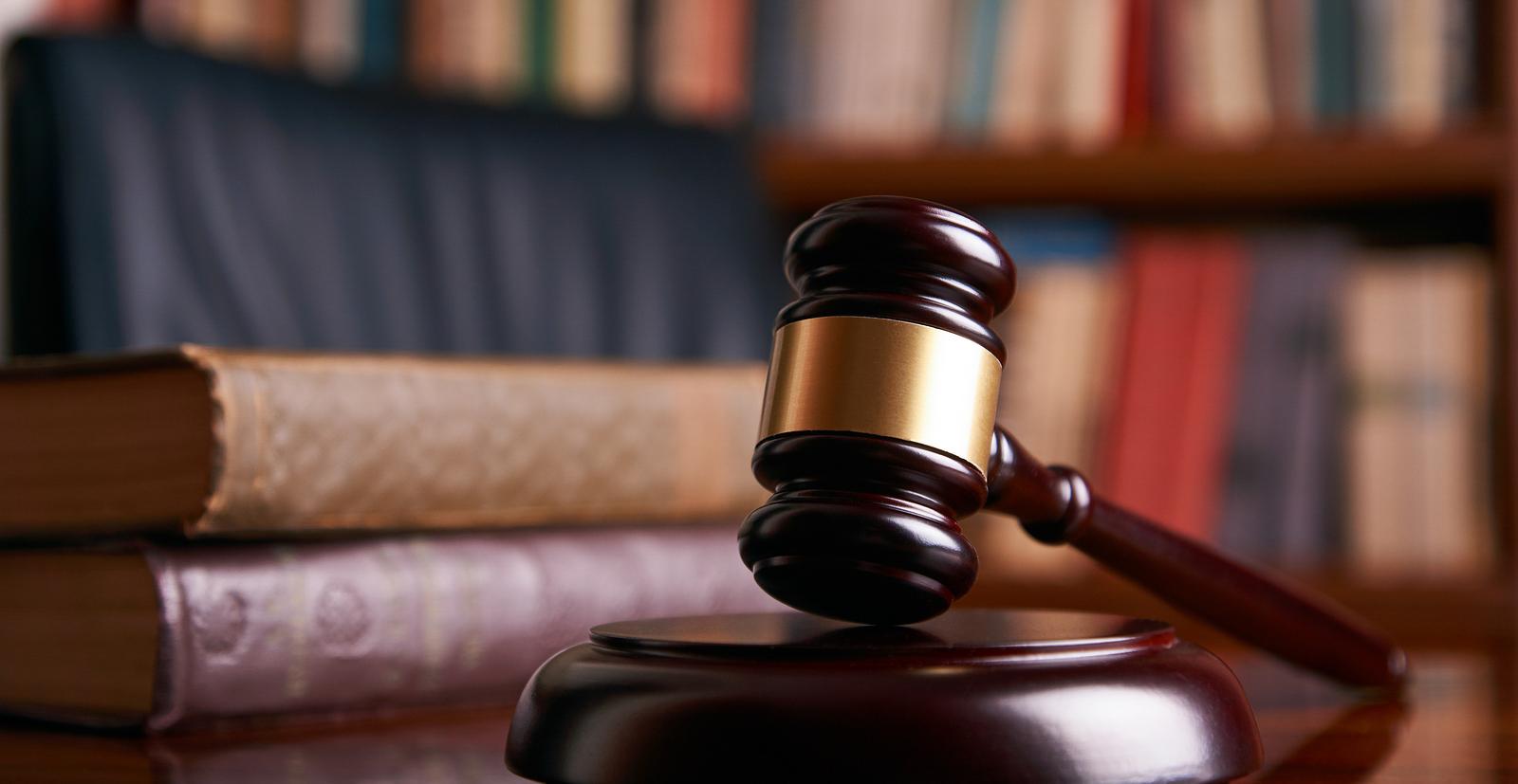 gavel and books on table