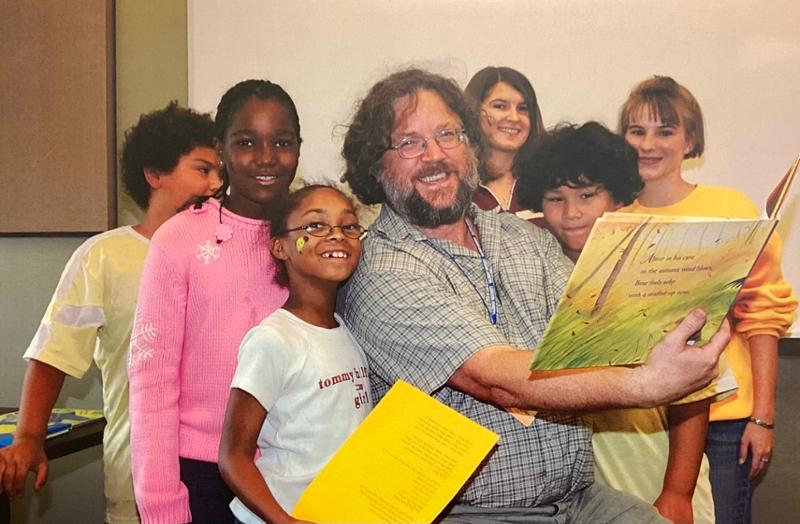 This photo graces a Seidel faculty-approved dedication plaque, unveiled during the Dedication Ceremony, to serve as an enduring symbol of Ernie’s generous spirit and love of Children’s Literature.