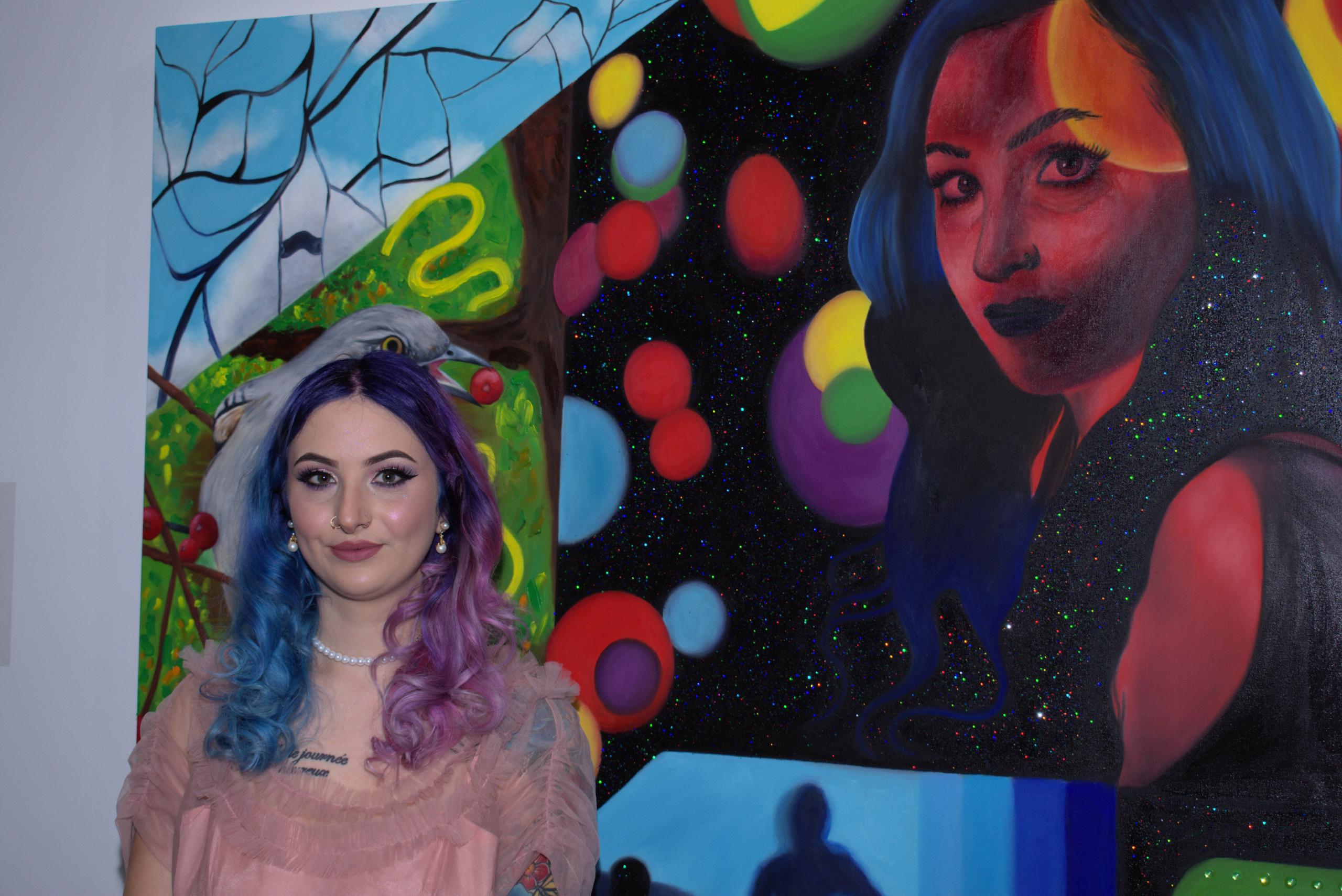 Arielle Tesoriero with her painting