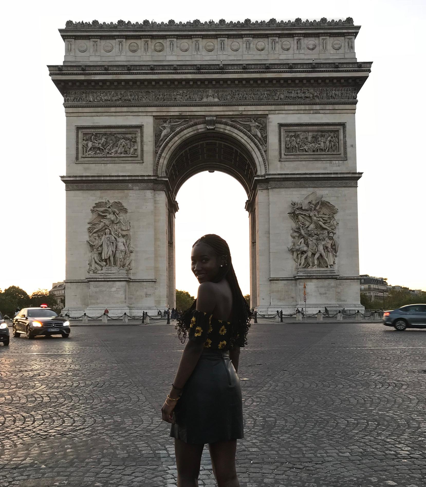 Student in front of the Arc de Triumph in Paris