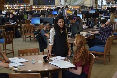 Student working on floor of GAC