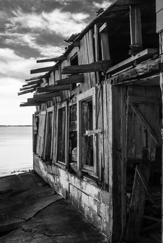 Award winning photograph by Salisbury Student. Showing boat house on the water