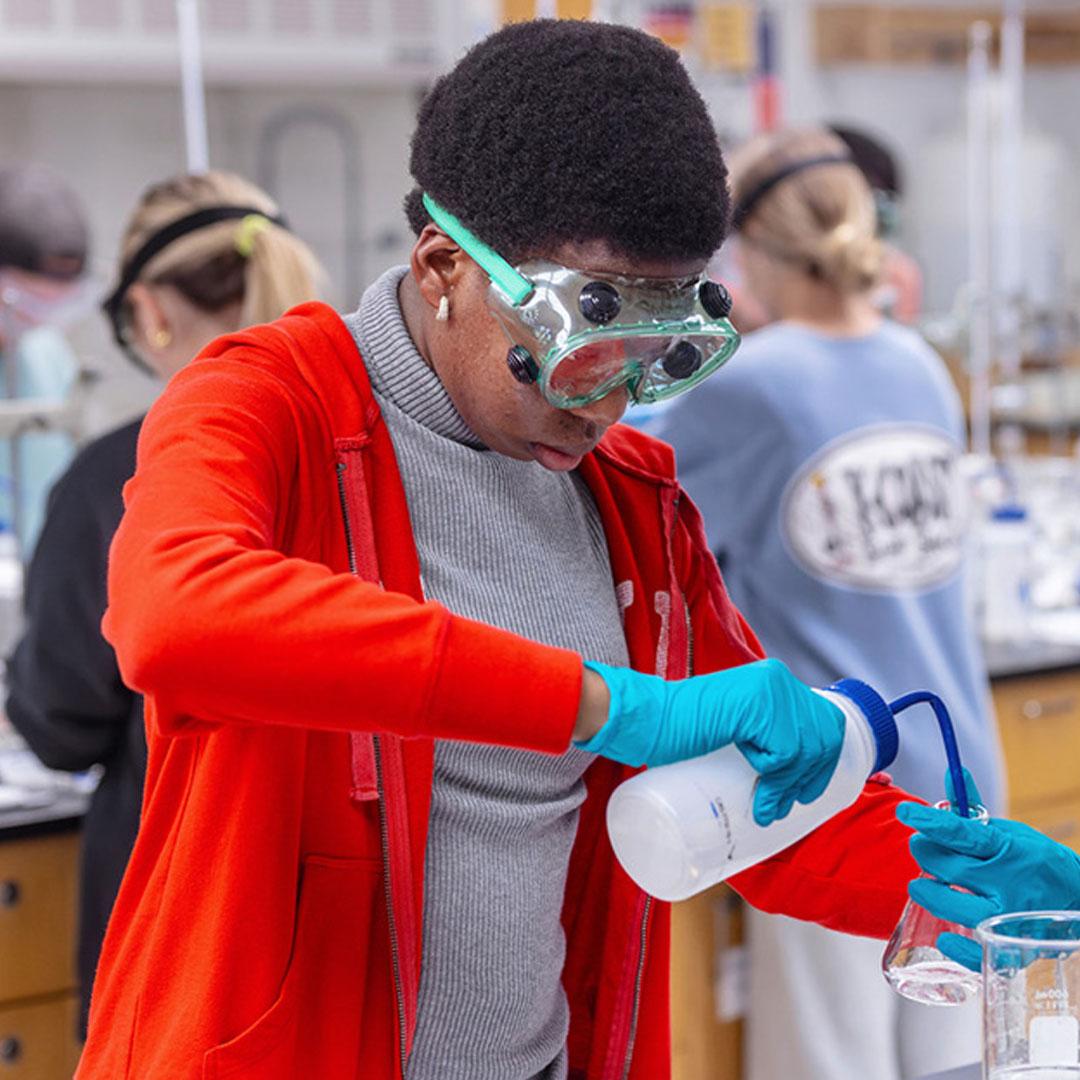 SU student in lab